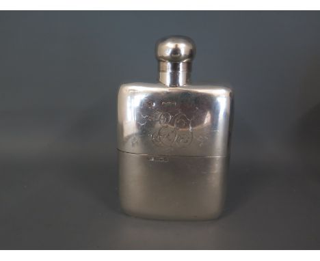 An Edward VII silver hip flask with additional base sheath monogrammed to front top half with dedication to rear by William N