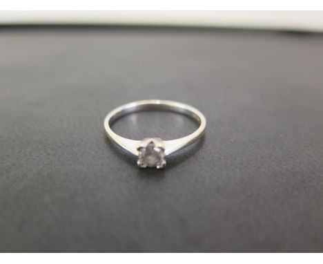 An 18ct gold brilliant-cut diamond single-stone ring - Diamond weight 0.25ct, stamped to band - Hallmarked Sheffield - Ring s