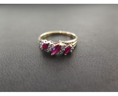 A ruby and diamond dress ring - Stamped 9k - Ring size R - Weight approx 2.9gms
Condition Report: Good - With light scratches