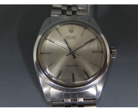 A Gentleman's Rolex Oyster Precision Automatic wristwatch in stainless steel case, silvered dial with silvered baton markers 