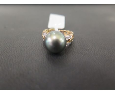 A 9ct gold cultured pearl and diamond ring - Hallmarked Birmingham - Ring size N 1/2 - Weight approx 5.1gms
Condition Report: