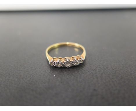 A diamond five-stone ring - Stamped 18ct - Ring size M - Weight approx 2.2gms
Condition Report: Good to fair - With light sur