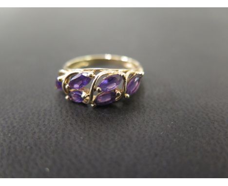 A 9ct gold amethyst dress ring - Hallmarked Birmingham - Ring size P - Weight approx 2.6gms
Condition Report: Good - With lig