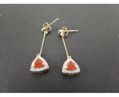 A pair of 9ct gold fire opal and diamond ear pendants - Hallmarked Birmingham - Length 3.2cms - Weight approx 2.6gms
Conditio