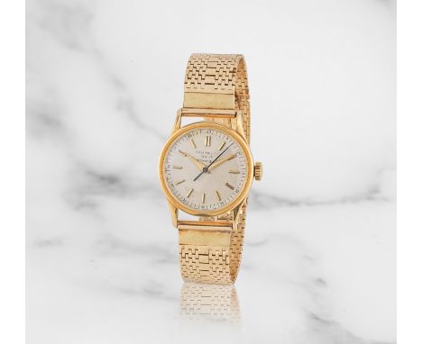 Patek Philippe. An 18K gold manual wind bracelet watch retailed by Tiffany &amp; Co.Patek Philippe. Montre bracelet en or jau