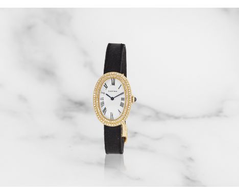 Cartier. A lady's 18K gold and diamond set manual wind wristwatchCartier. Montre de dame en or jaune 18K (750) sertie de diam