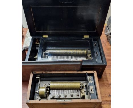 Two late 19th century Swiss musical boxes, both in inlaid lacquered and rosewood cases, one with 15.5cm comb and the other 23