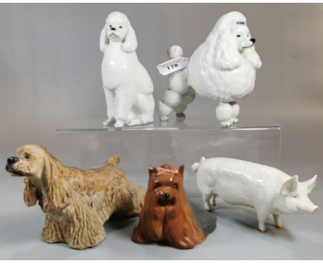 Collection of ceramic and pottery animals to include: Yorkshire Terrier, Beswick and USSR Poodles and a Beswick CH Wall study