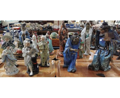 Collection of mainly pottery Oriental/Chinese Immortal figures and figurines, copper finish Buddha figurine etc. (15) (B.P. 2