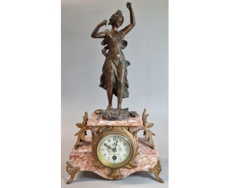 Early 20th century French bronzed spelter and veined marble figural mantel clock having French brass drum movement. 44cm high