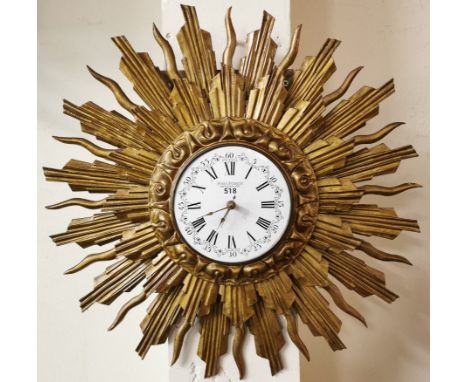 Vintage style sunburst clock with enamel face and Roman numerals. (B.P. 21% + VAT)