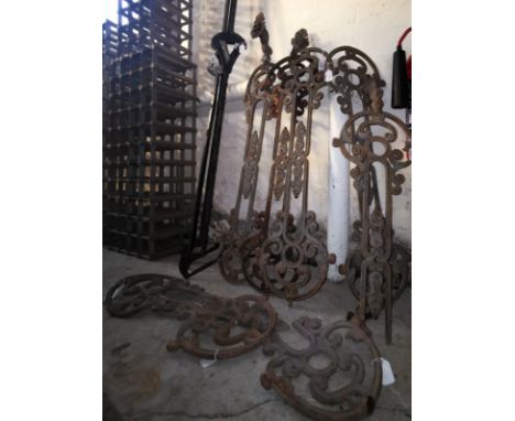 A group of assorted cast metal Art Nouveau style cast metal balustrade sections, together with three wrought metal rods with 