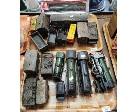Collection of vintage O gauge tinplate locomotives and mainly tenders/carriages, the locos marked 'Duke of York', 'Princess E