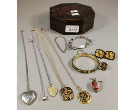 Oriental design lacquered octagonal box, the interior revealing assorted jewellery to include: silver identity bracelet, chai