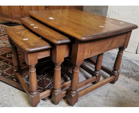 Nest of three vintage Ercol elm tables. (B.P. 21% + VAT)