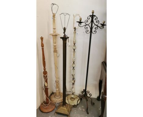 Collection of standard lamps: wooden, onyx, brass and classical style, together with a wrought iron three section free standi