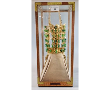 A cased reproduction copy of a Korean Silla style archaic 'jade' and 'gold' crown originally from the 5th to the 7th centurie