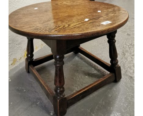 Mid century oak lamp table of circular form. 52cm diameter approx. (B.P. 21% + VAT)