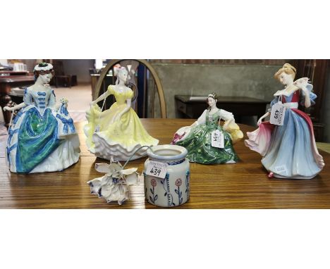 Four Royal Doulton bone china figurines to include: 'Amy', Figure of The Year, 'Elyse', 'Ninette' and 'Linda', together with 