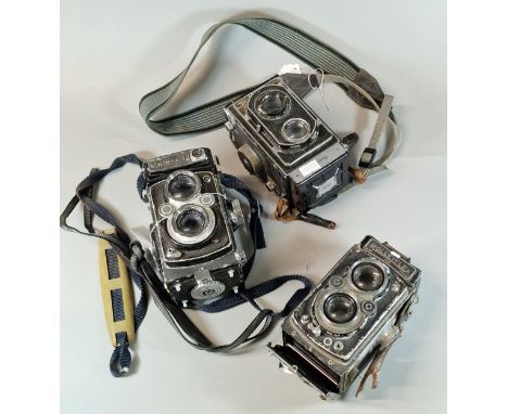Yashika-12 twin lens reflex roll film camera, together with a similar Zeiss Icon Compur twin lens reflex camera and another R