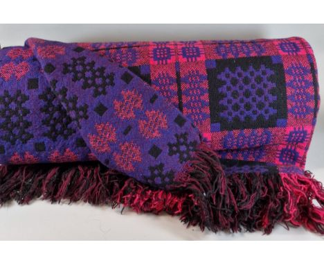 Vintage purple and pink geometric Welsh carthen. (B.P. 21% + VAT).&nbsp;Dimensions - 208x232cm approx. Heavy fraying to one e
