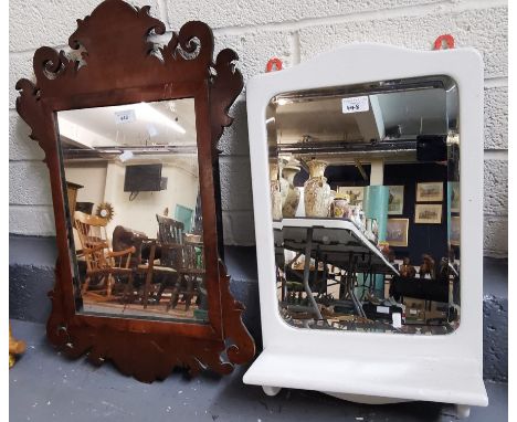 Georgian design mahogany fret cut scroll decorated mirror. 68cm high approx. Together with a modern white painted mirror with