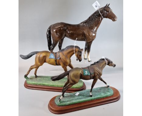 After John Skeating, two composition model racehorses to include, 'The Racing Game' together with a Beswick ceramic horse. (3