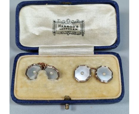 Pair of 9ct rose gold and mother of pearl cufflinks, in original box marked Harrods London. 4.9g approx. (B.P. 21% + VAT)