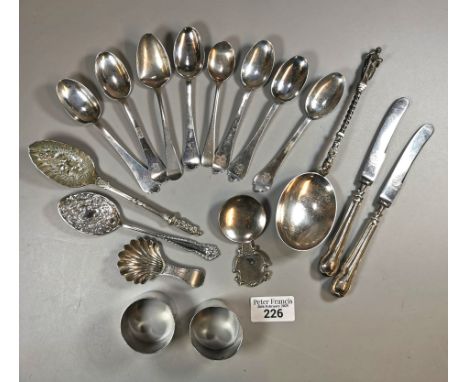 Bag of silver and silver plated flatware to include: shell shaped tea caddy, various spoons, apostle spoons, napkin rings etc