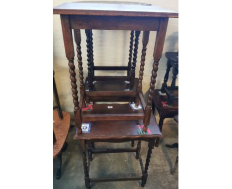 Four similar early 20th century oak barley twist lamp or occasional tables together with an early 20th century oak barley twi