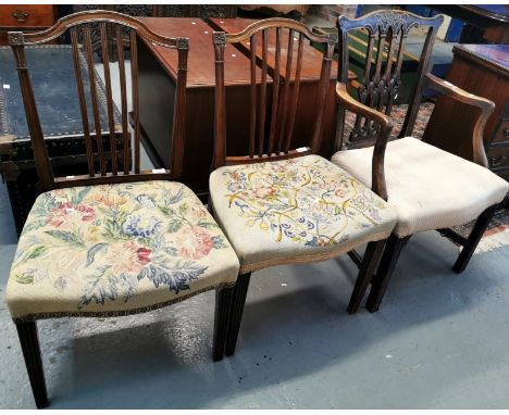 Two similar mahogany Regency dining chairs with stuff-over seats on fluted tapering legs together with another 19th century m