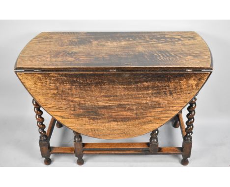 A Mid 20th Century Oak Drop Leaf Gate Leg Barley Twist Dining Table, 103cms Wide 
