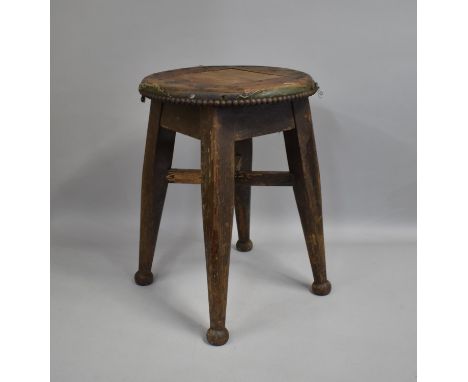 A Vintage Circular Topped Stool with Turned Supports, 31cms Diameter and 46cms HIgh 
