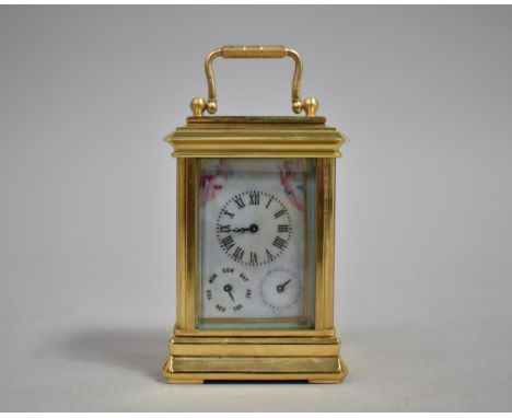 A Reproduction Gilt Cased Sevres Style Miniature Carriage Clock with Two Subsidiary Dials for Day and Date, Panels Decorated 
