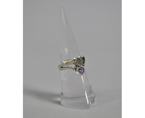 A Silver Dress Ring with Amethyst Teardrop Stone 