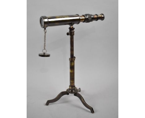 A Reproduction Model of a Brass Telescope on Tripod Stand as Made by Ottway and Co, 1915, 23cms Long 
