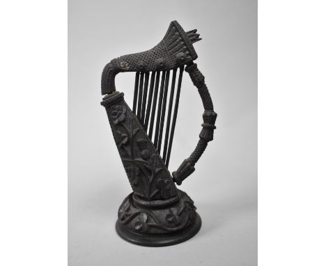 An Irish Carved Bog Oak Model of a Harp, Some Losses, 17cms High 