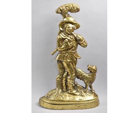 A Late 19th Century Weighted Brass Door Porter in the Form of Woodsman Carrying Axe with Dog at Side, 39cms High 