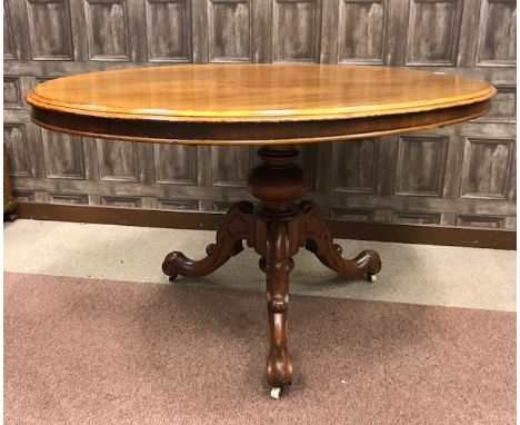 VICTORIAN MAHOGANY OVAL TIP-UP BREAKFAST TABLEon turned baluster pillar with tripod legs, 134cm long