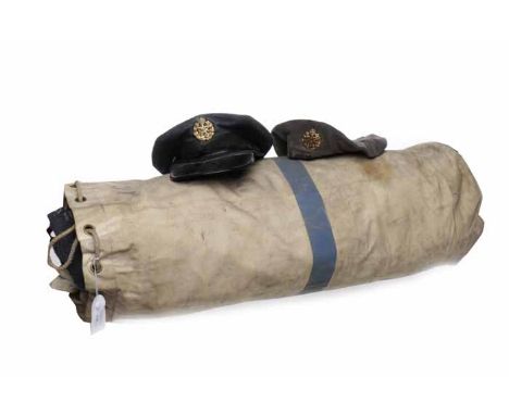 RAF KIT BAGcontaining a belted tunic, two pairs of trousers, a greatcoat, a war service dress blouse, a black tie, two blue s