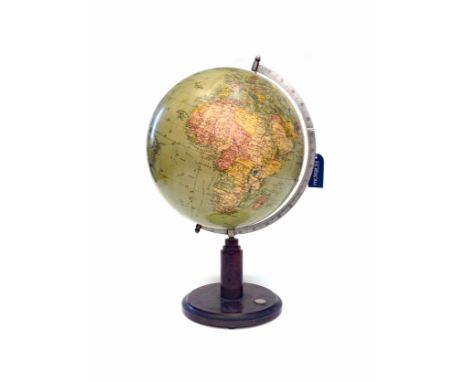 20TH CENTURY TERRESTRIAL GLOBE on a stepped mahogany stand and circular base, inset with compass, 52cm high 