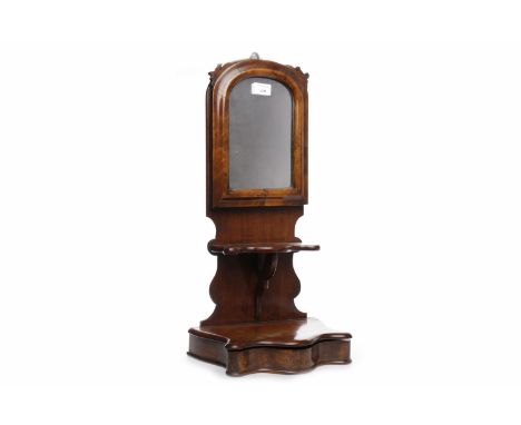 VICTORIAN MAHOGANY SHAVING STANDthe arched mirror above shaped shelf and base with drawer, approximately 57.5cm high, loss to