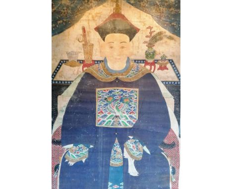 A Qing dynasty Chinese batik ancestral or immortal portrait set on a paper scroll, (208 x 93 cm external, 160 x 85 cm interna