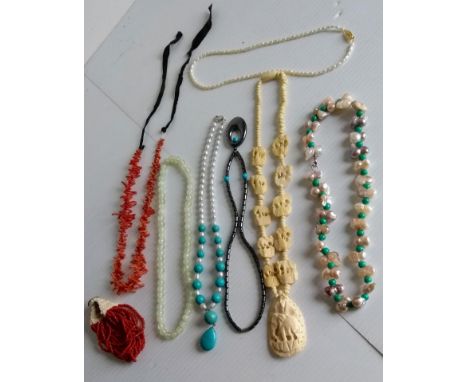 A selection of vintage organic bead necklaces to include, pearl, coral, ivory, etc 