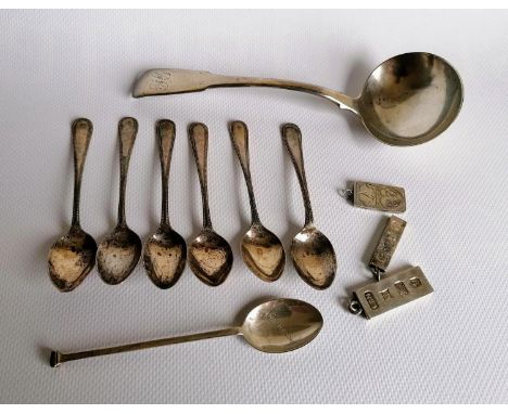 A George IV silver fiddle pattern sauce ladle by William Nixon, London, 1818, 17 cm, a set of six George V silver coffee spoo
