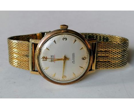 An early 1960's Smith Everest Automatic gold-cased wristwatch, the circular dial with applied Arabic and spearhead hour marke