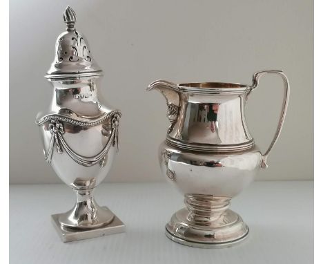An Edwardian silver sugar shaker in the Adam style  with bead and festoon decoration on a square base by Haseler Brothers, Lo