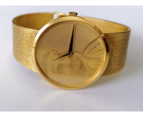 A Chopard Automatic 18ct yellow gold bracelet dress watch, 32mm dial, image transposed to face, numbered 129210, 1038 1, Swis