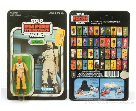 Kenner Star Wars vintage The Empire Strikes Back Bossk 3 3/4" figure, Mint, within Good (dented and yellowed) bubble, upon Go