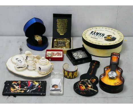 Elvis Presley Memorabilia, includes a bone china tea set, original boxed Zippo lighter, watches, brooches and more.